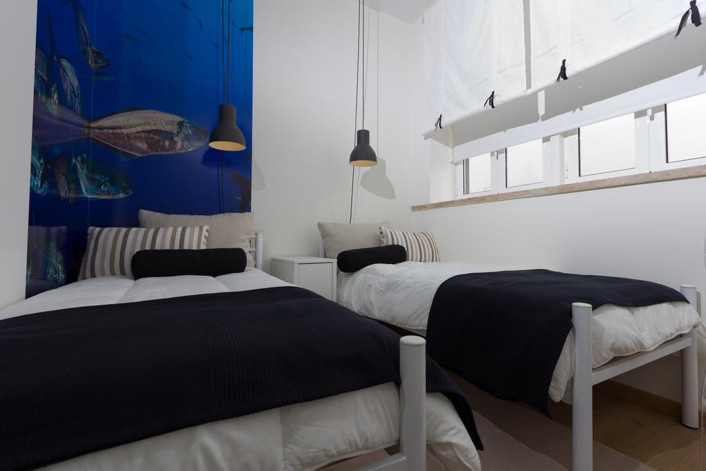 Hotel Turismo do Seculo Estoril Habitación foto A bedroom at the hotel
