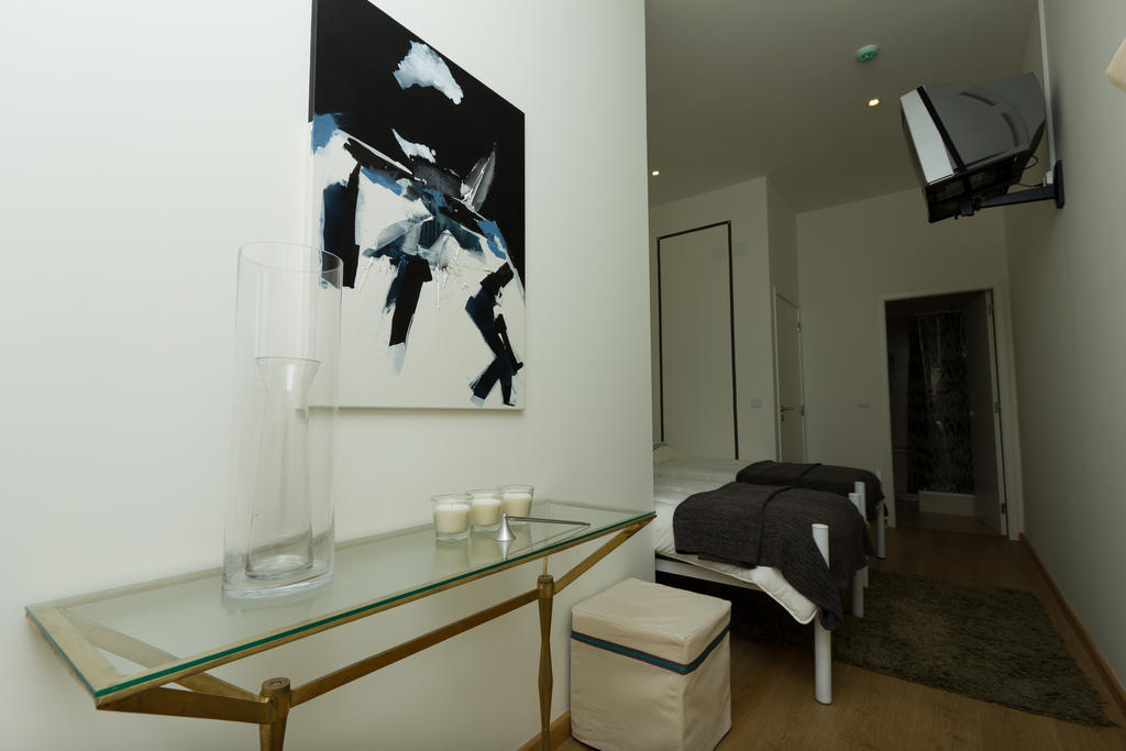 Hotel Turismo do Seculo Estoril Habitación foto A bedroom in the apartment